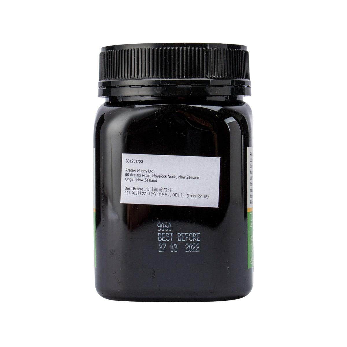 Manuka honey jar back view with printed label and date text