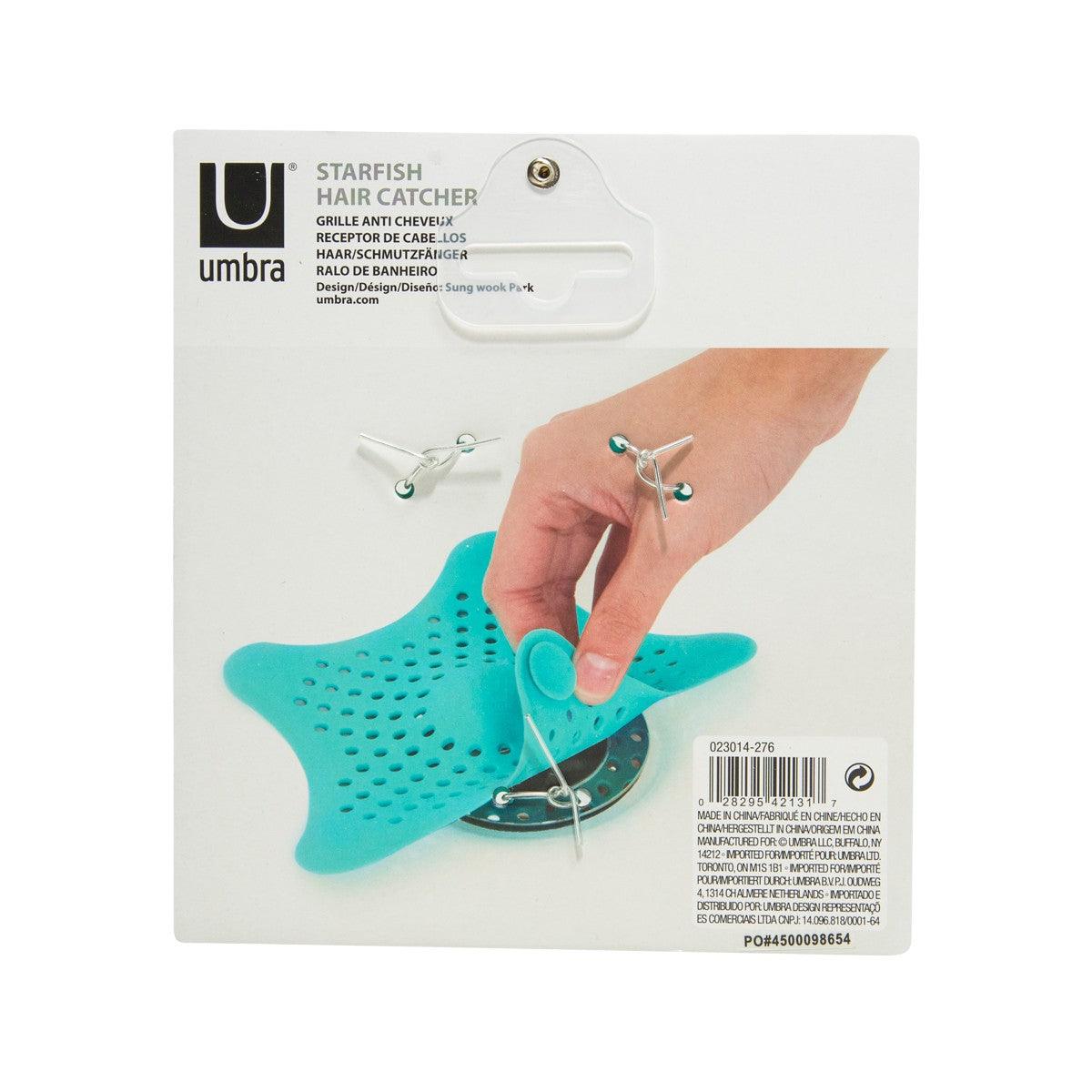 Starfish hair catcher teal silicone in packaging, includes suction base and ring