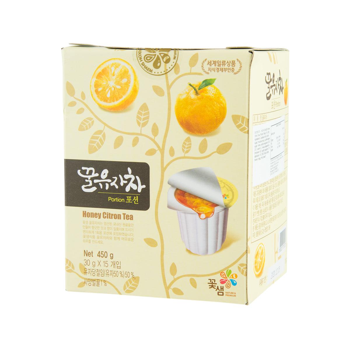 Honey citron tea portion pack box, side view with teacup illustration and citrus fruit