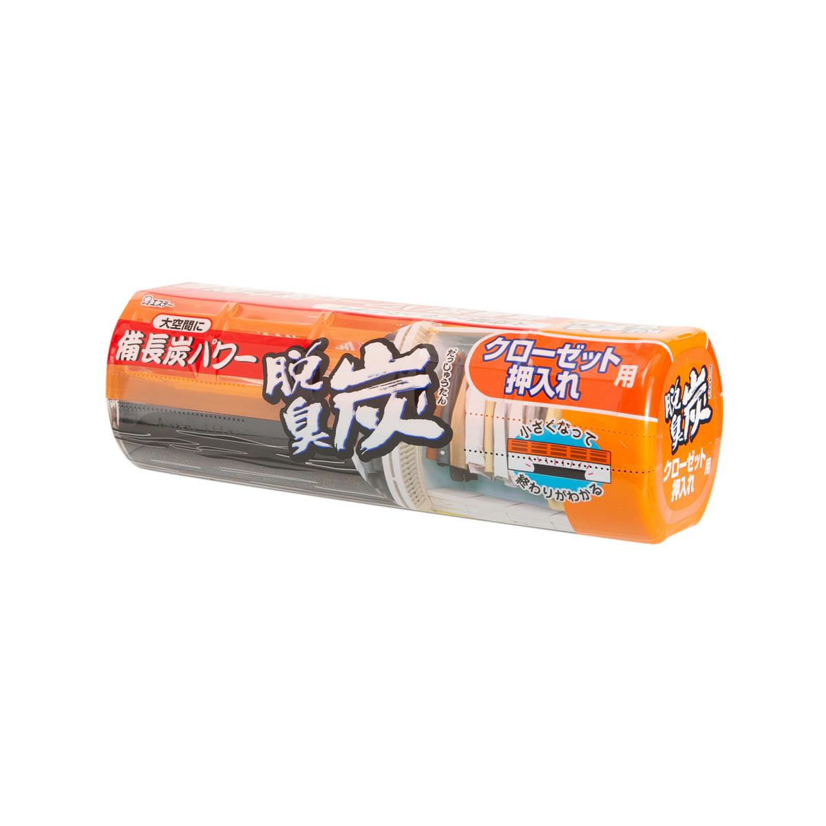 Orange packaged closet deodorizer insert with clear window and dark gray tray.