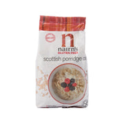 NAIRN'S gluten free Scottish porridge oats pouch with porridge bowl and berry topping
