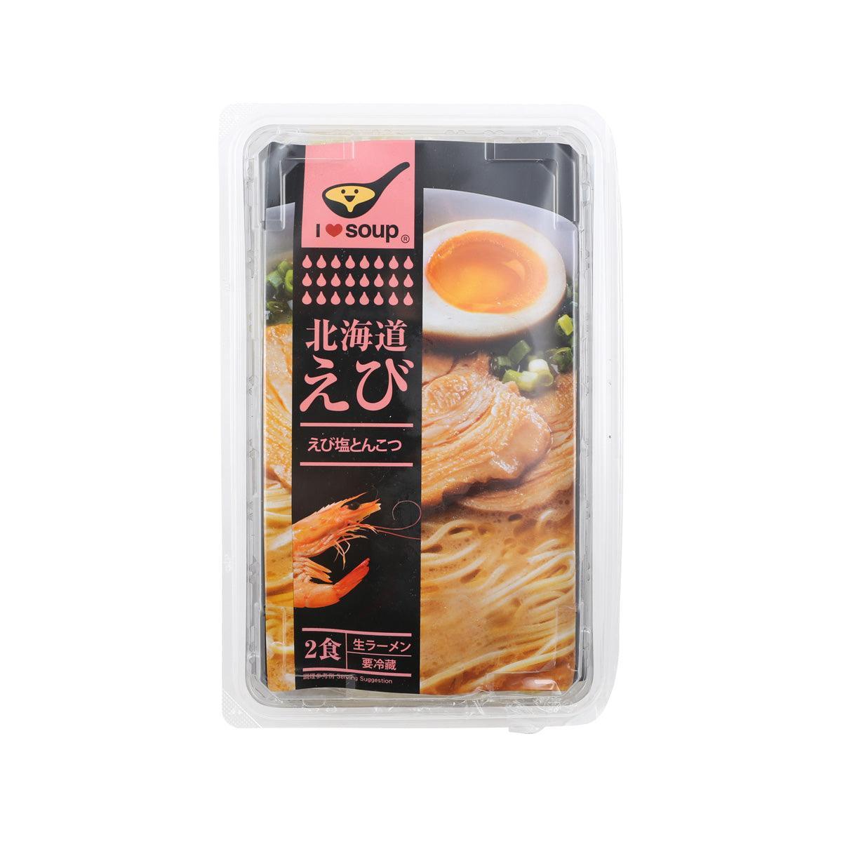 Shrimp ramen soup kit in clear plastic tray with orange broth and shrimp image