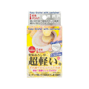 Compact spice grinder box with easy grater and container on front, PEARL METAL