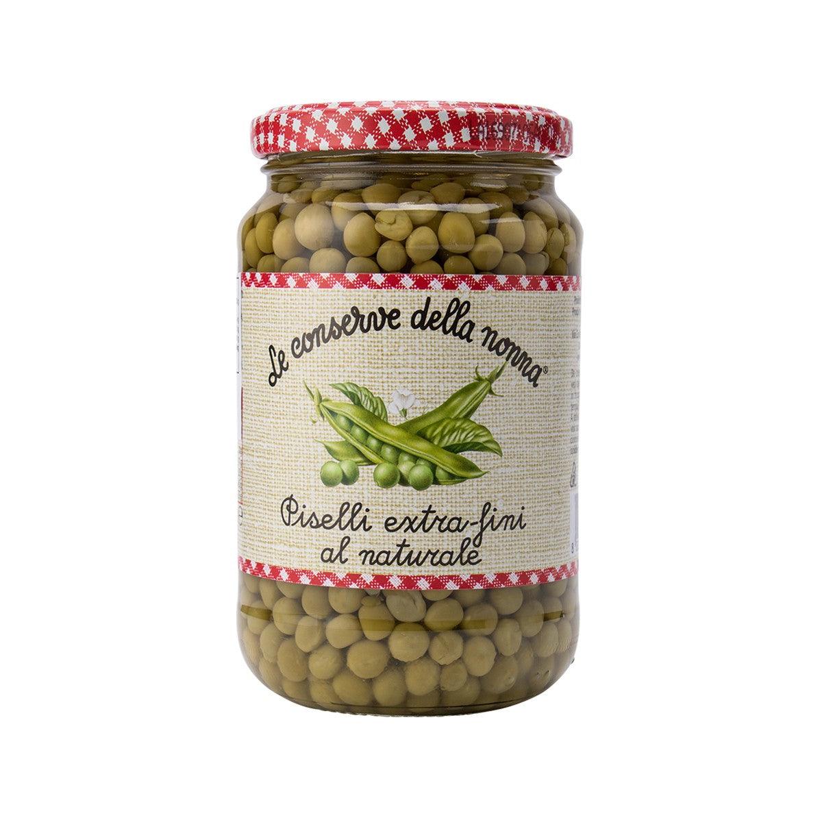 Jar of peas in brine with green peas visible, rustic label, red gingham lid