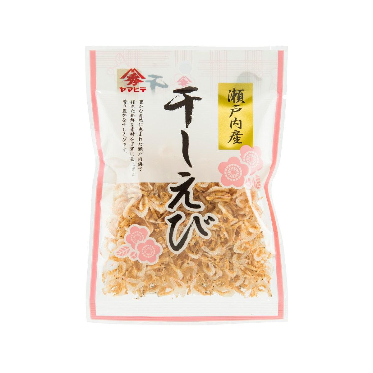 Dried small shrimp in sealed pouch, pale orange flakes and shrimp pile