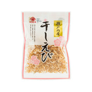 Dried small shrimp in sealed pouch, pale orange flakes and shrimp pile
