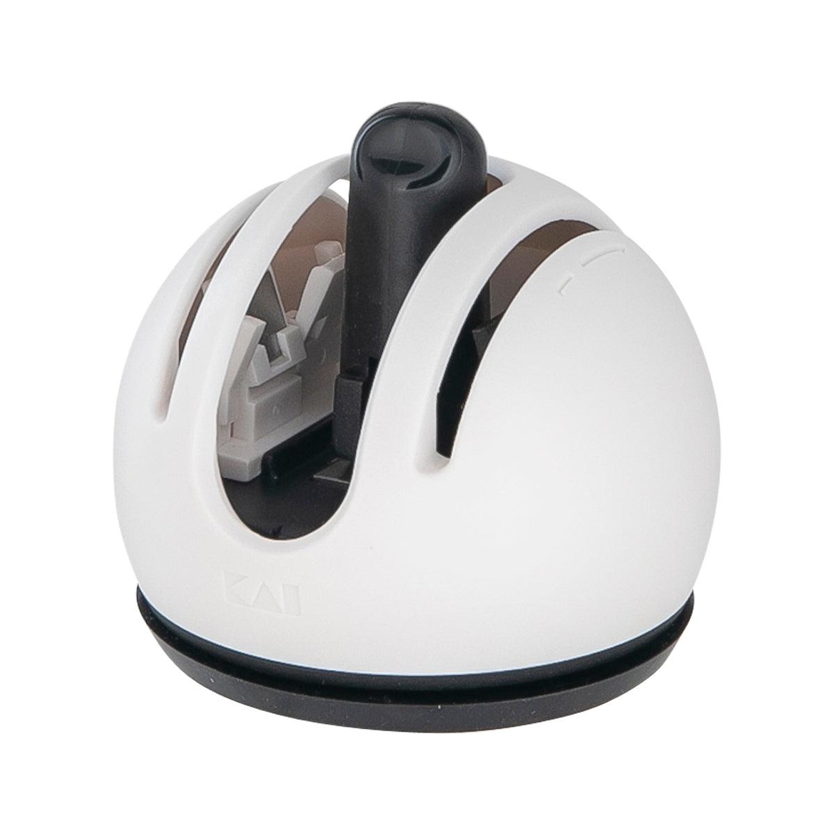 KAI pencil sharpener, white base with black sharpening opening