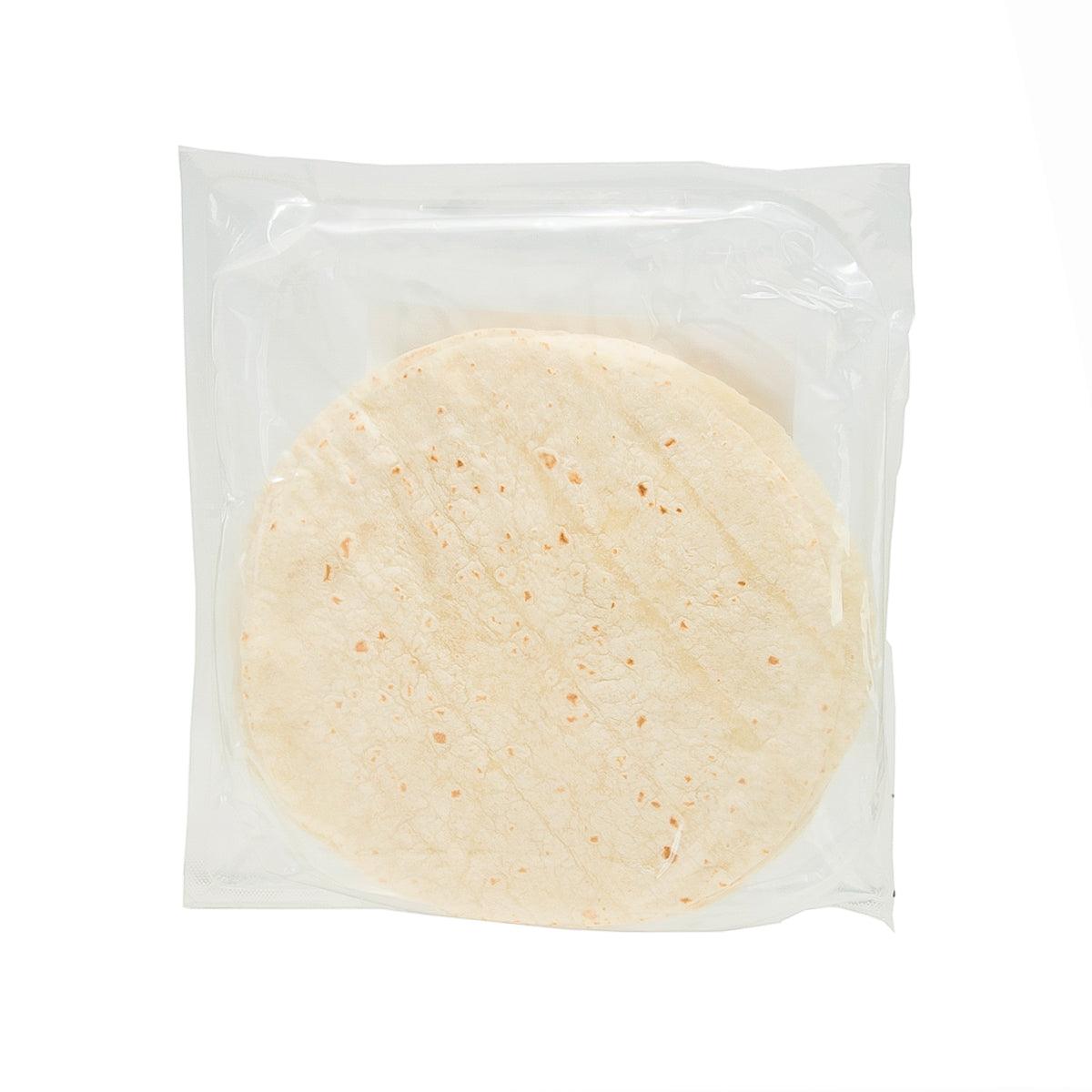 Plain tortilla flatbread round in clear sealed bag