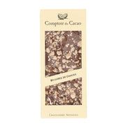 Milk chocolate bar with cookie pieces, shown on a COMPTOIR DU CACAO package