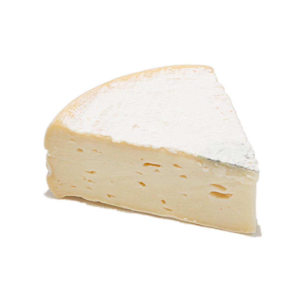 Reblochon de Savoie AOP raw milk cheese wedge with pale creamy interior