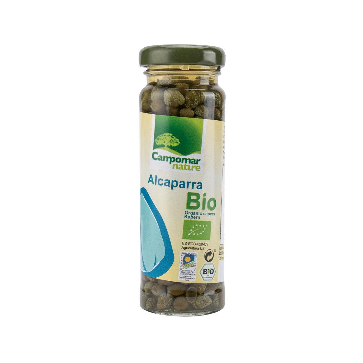 Jar of organic capers with green lid, front label shows Alcaparra Bio
