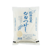 2kg rice bag, white with blue Japanese text and small rice graphic