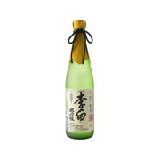 RIHAKU daiginjo sake bottle with green glass, gold cap, blue shibori drawstring