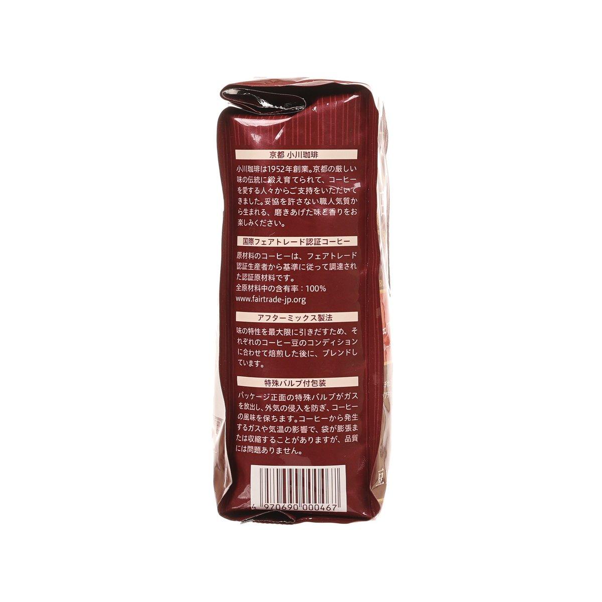 Organic Fairtrade whole bean coffee bag, burgundy side back with product details and barcode