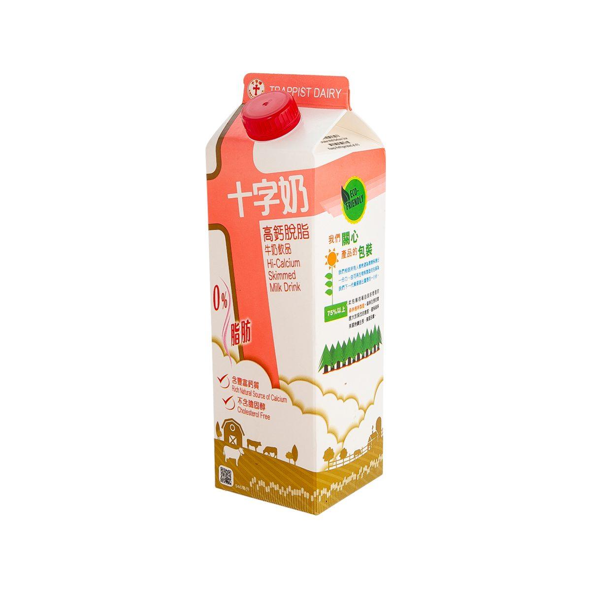 Hi-calcium skimmed milk drink carton with red cap, back view.