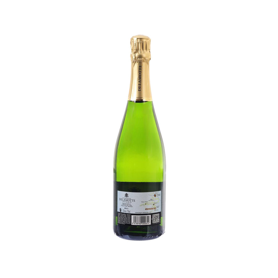 DELAMOTTE Brut champagne bottle, green glass with barcode label and gold foil