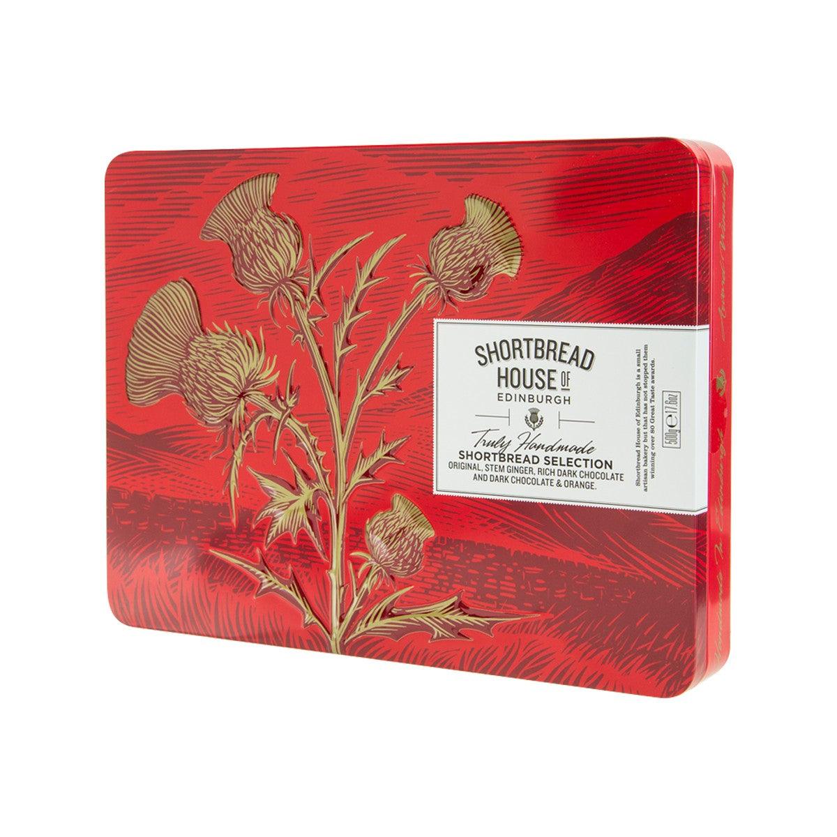 Red shortbread selection tin with floral artwork and front label, House of Edinburgh