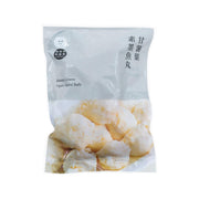 Frozen veggie squid balls in clear bag, pale golden and white pieces