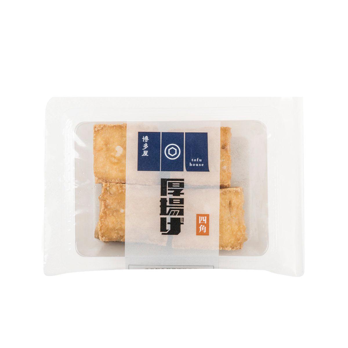 Packaged deep-fried tofu cubes, golden-brown, 4 pieces