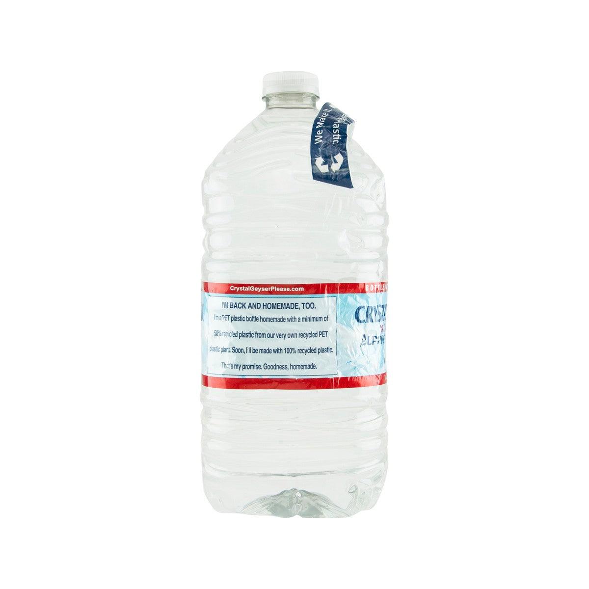 Crystal Geyser spring water bottle, back label text and seal visible