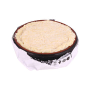 Round St Marcellin raw milk cheese wheel with white bloomy rind