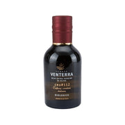 Extra virgin olive oil bottle with burgundy cap and dark label