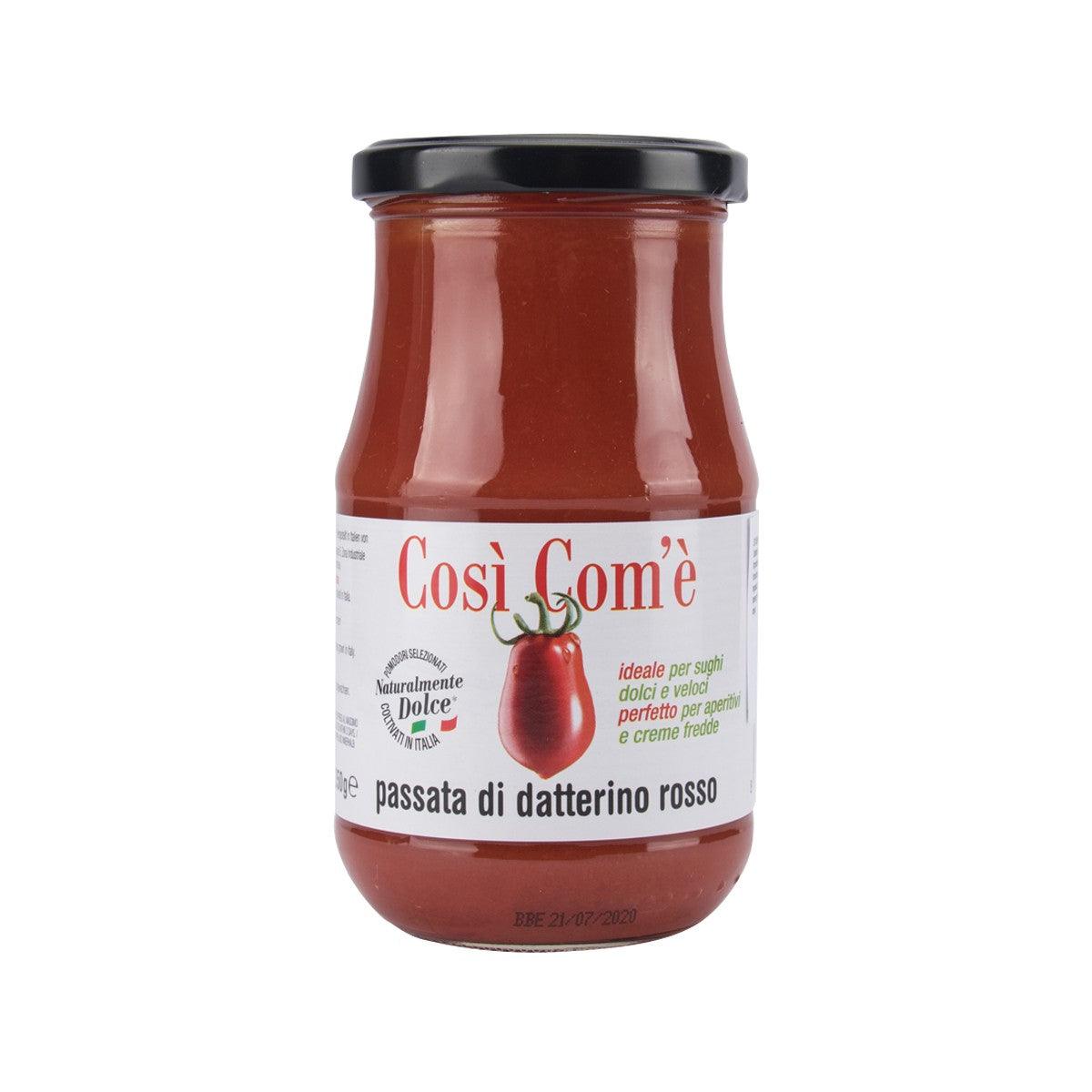 Jar of red tomato puree with black lid