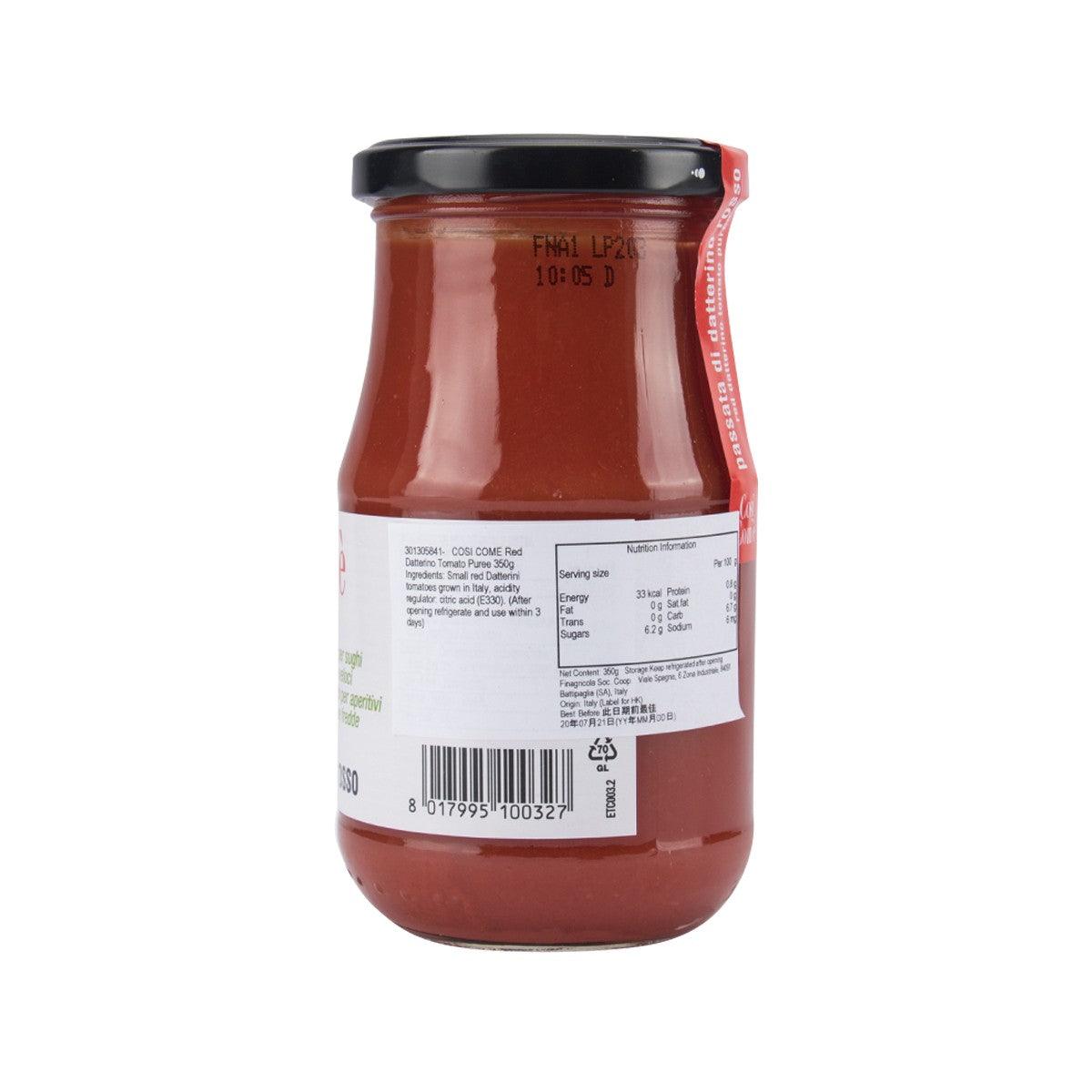 Glass jar of red tomato puree with black lid, back label visible
