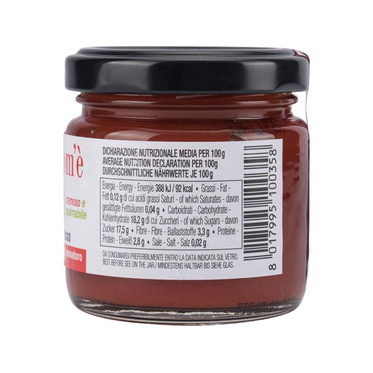 Red tomato paste jar with black lid; side panel nutrition facts and barcode.
