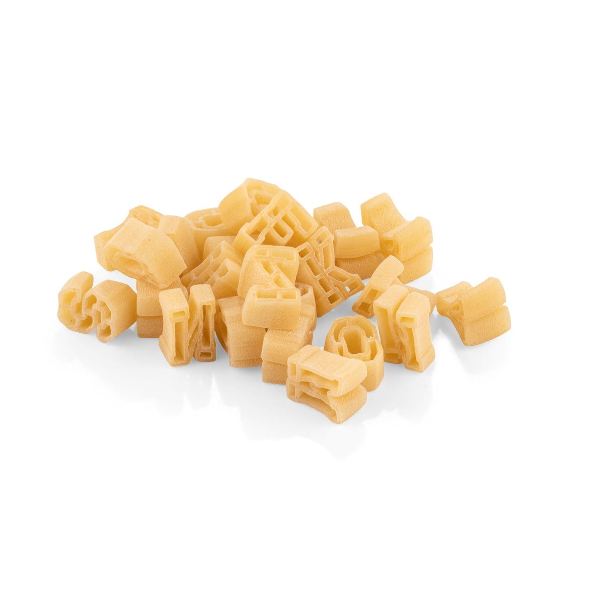 Alphabet-shaped pasta pieces, light yellow, letter and maze shell shapes