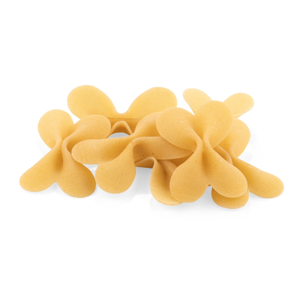 Yellow farfalloni bowtie pasta pieces, ready to cook
