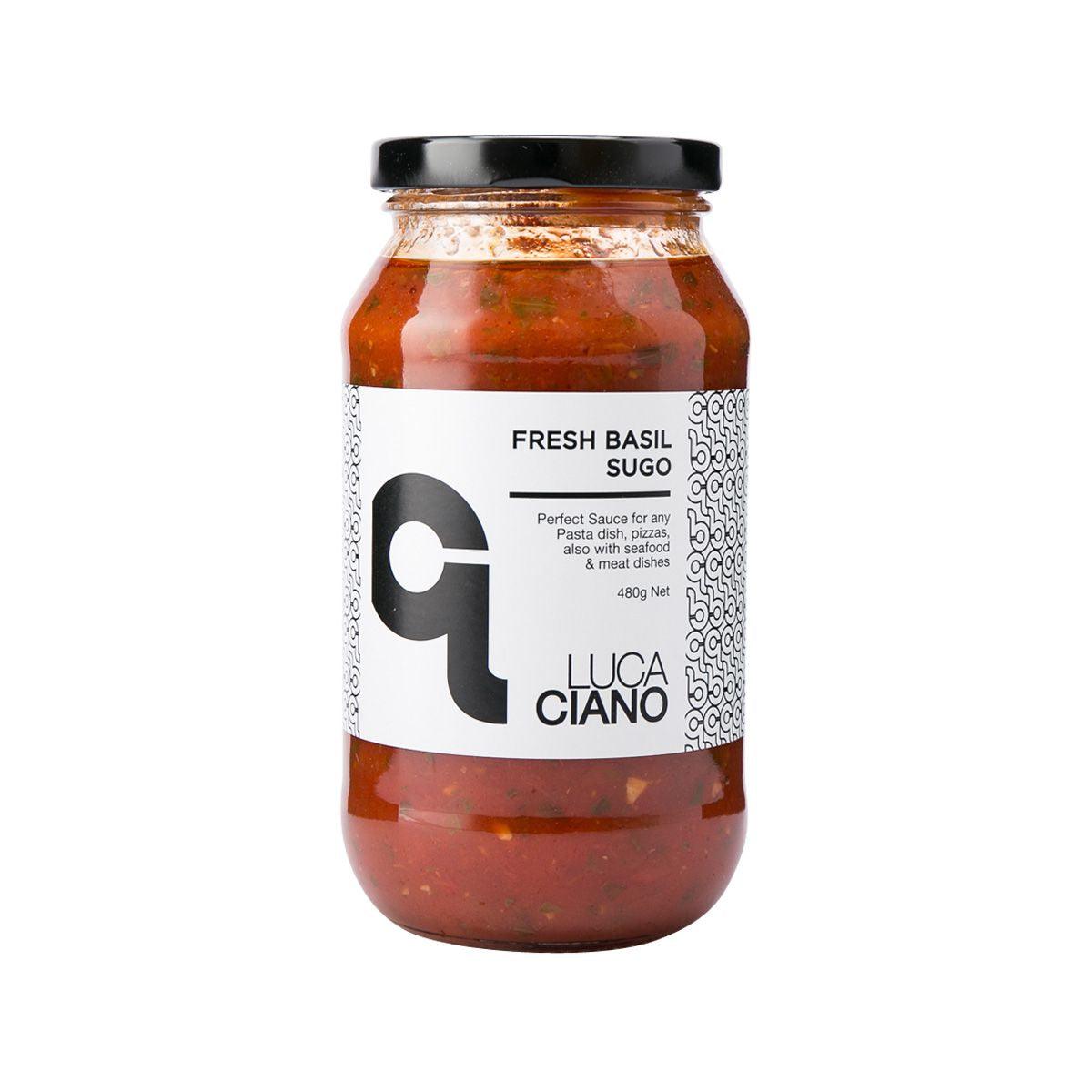 Fresh basil tomato sauce jar, glass with black lid, red sauce with basil flecks