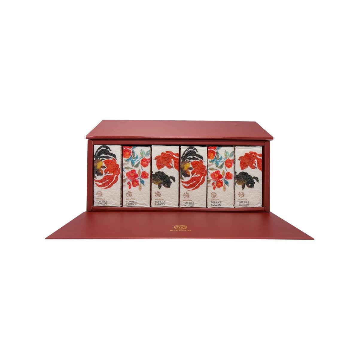 Opened rice gift box front view with six printed rice packages inside