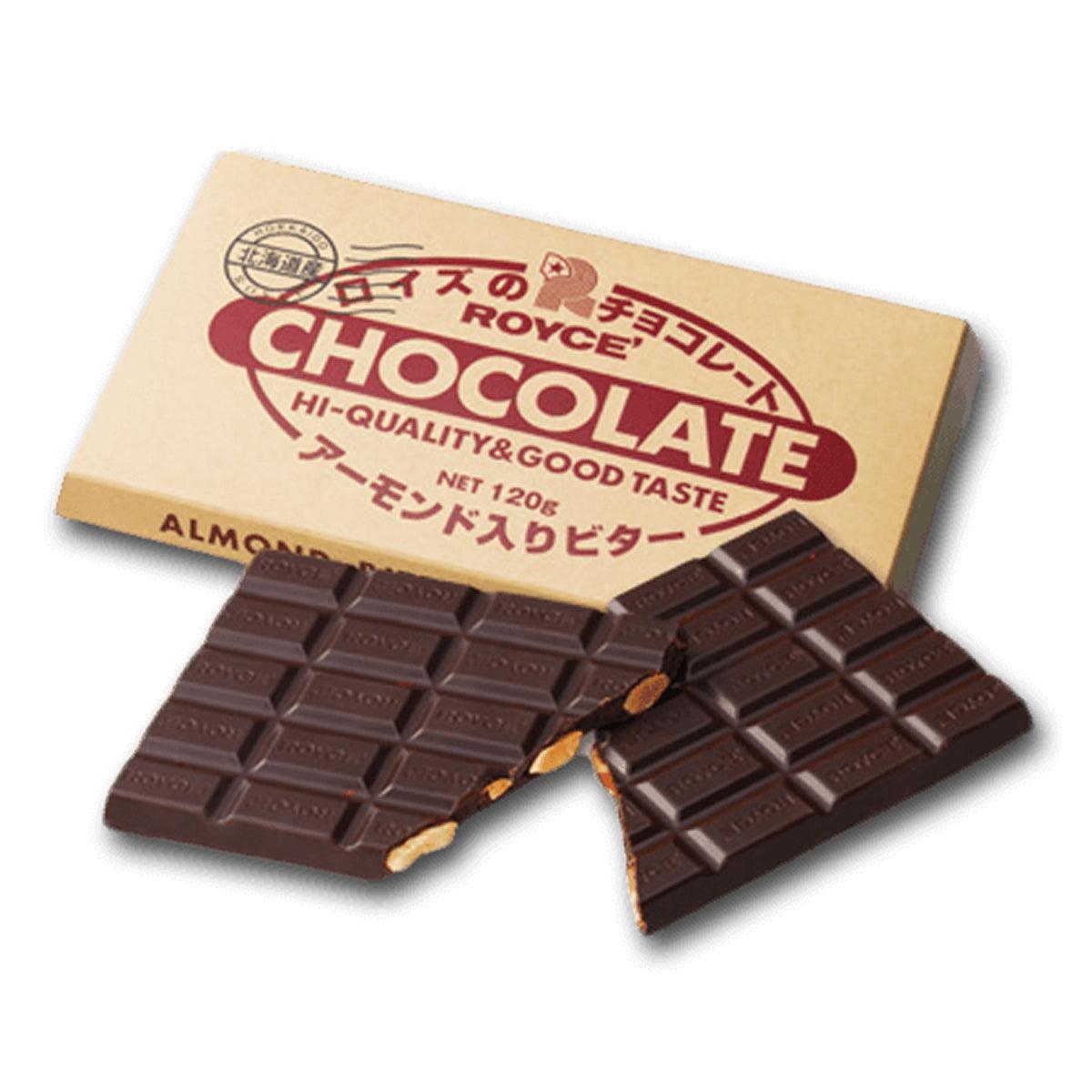ROYCE' dark chocolate bar with almond pieces, broken squares.