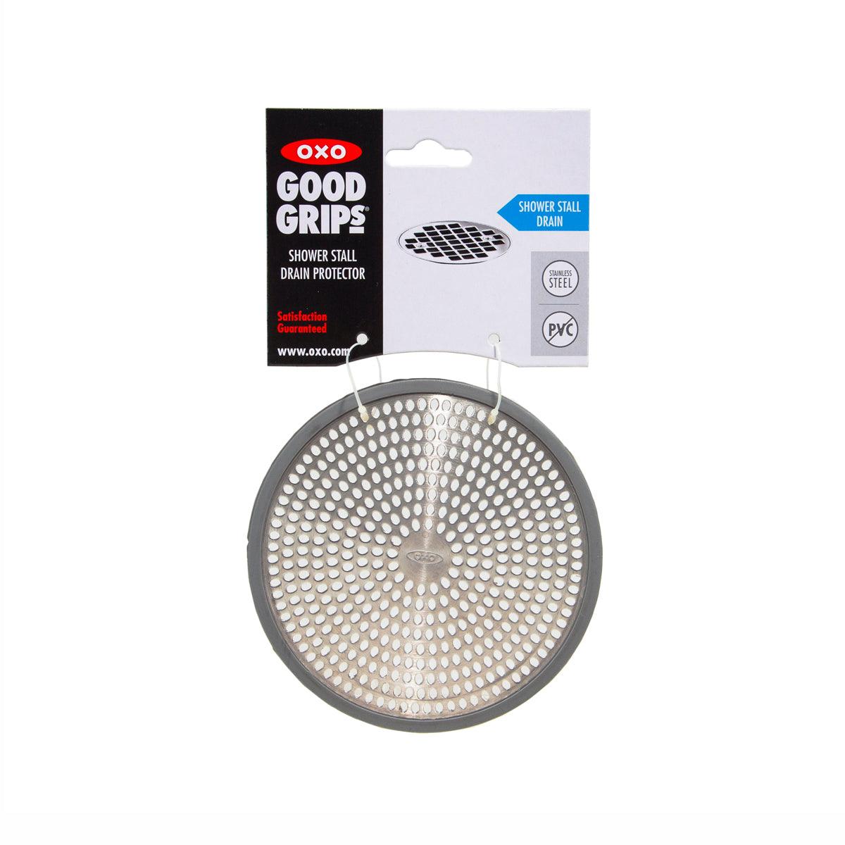 Circular shower stall drain protector strainer with small perforations, gray rim