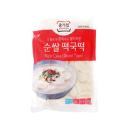 Sliced rice cakes in sealed pack, pale white discs, JONGGA brand