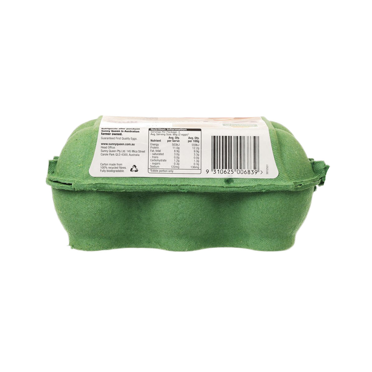 Organic free range egg carton back label on green tray, barcode visible