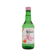 Peach-flavored soju bottle with green glass and pink cap; front label visible