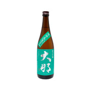 DAINA Junmai Ginjo sake bottle, amber glass with green label and foil top