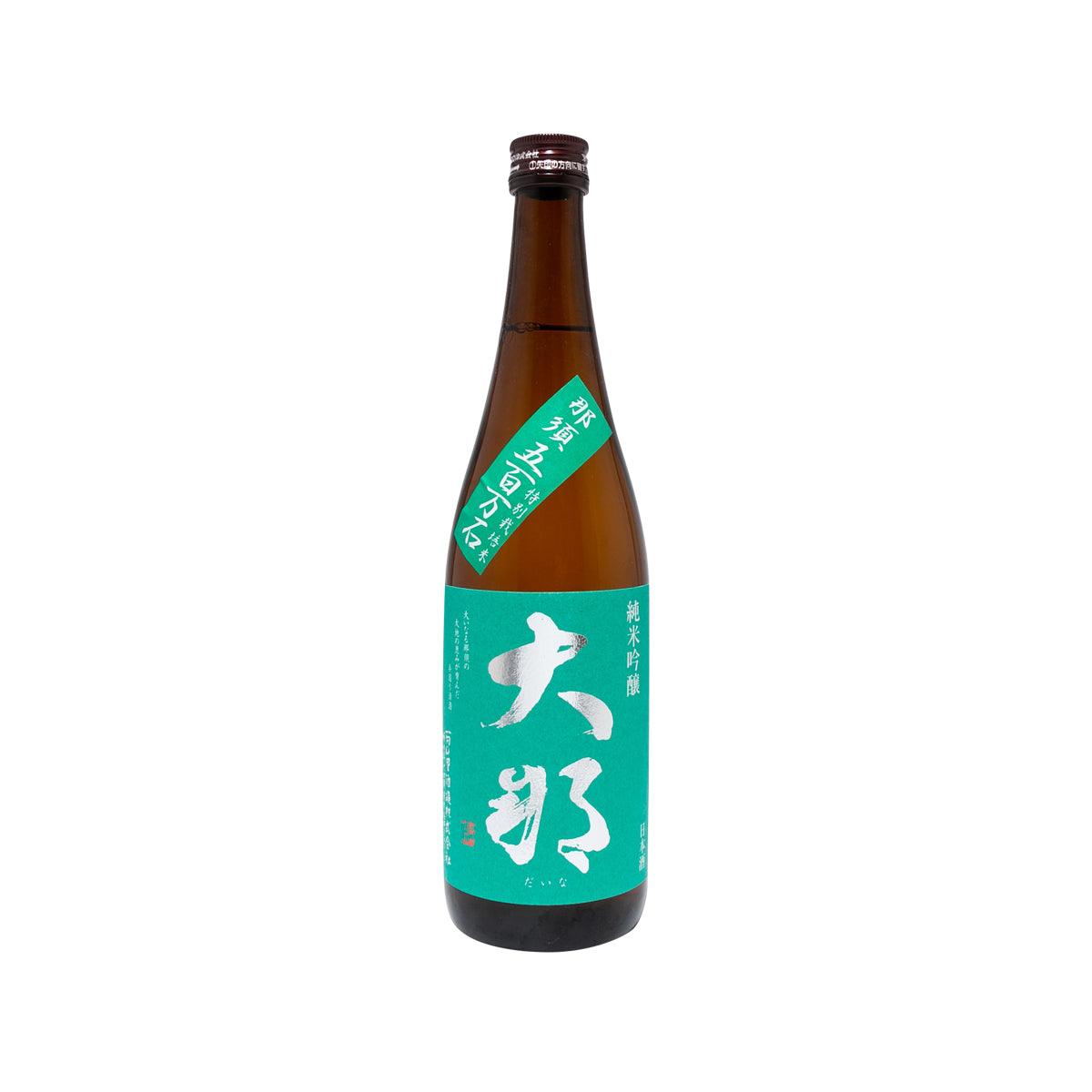 DAINA Junmai Ginjo sake bottle, amber glass with green label and foil top