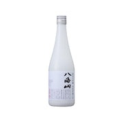 Sake bottle with frosted label and black Japanese calligraphy on front