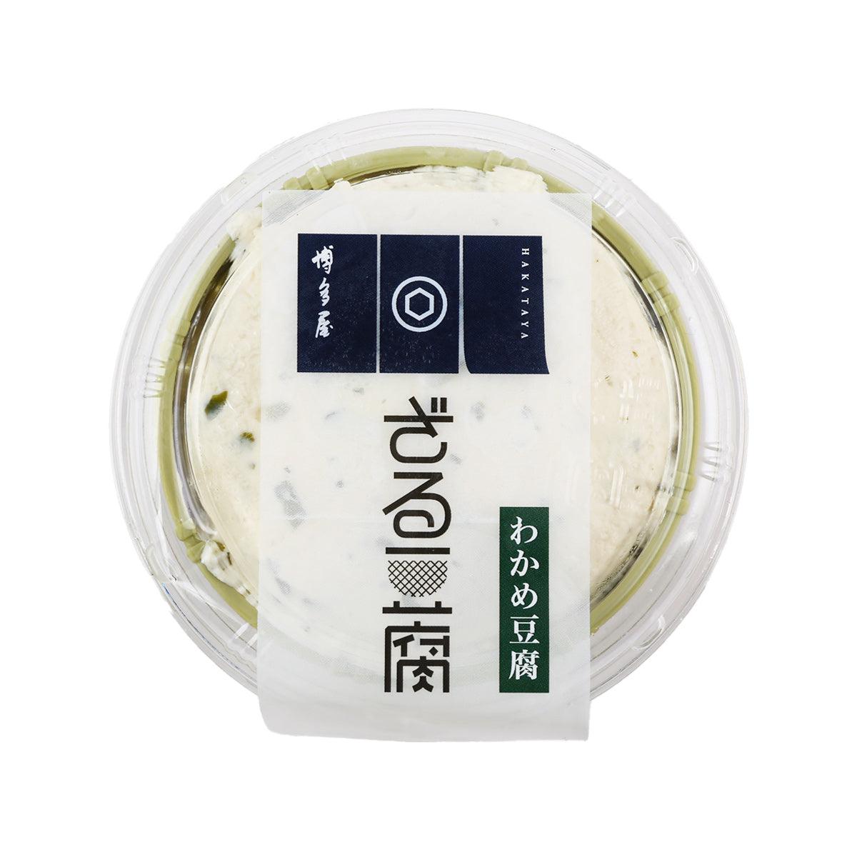 Seaweed zaru tofu cup with clear lid; pale tofu topped with green seaweed bits