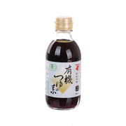 Organic soup base bottle with dark brown liquid and gold cap, front label.