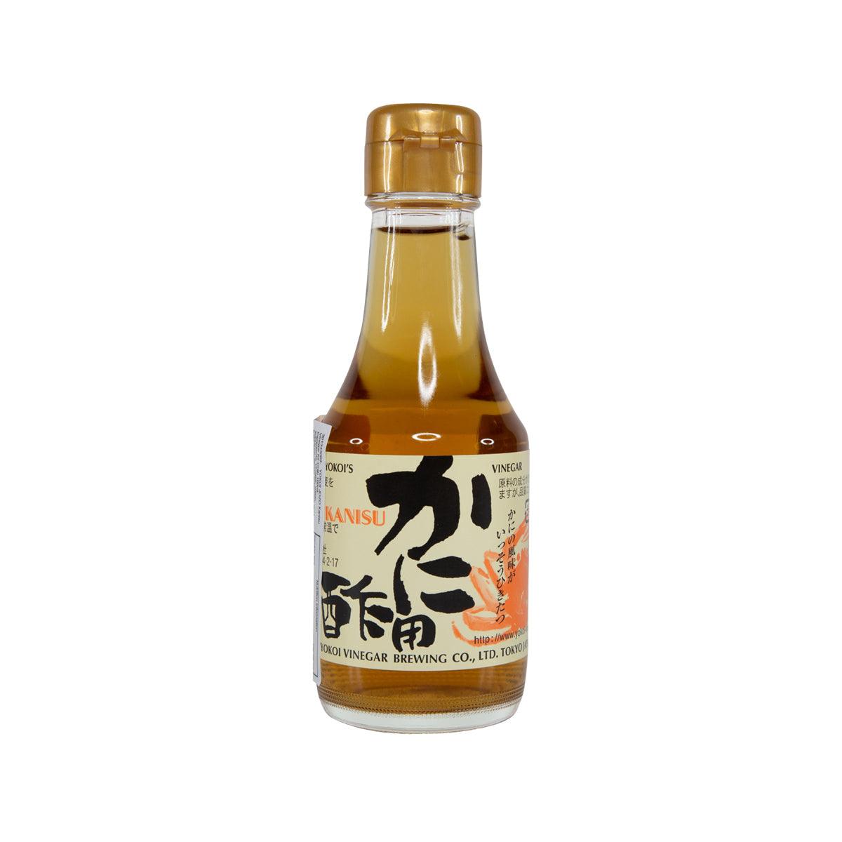Kanisu seasoned vinegar bottle with amber liquid, clear glass, and gold cap