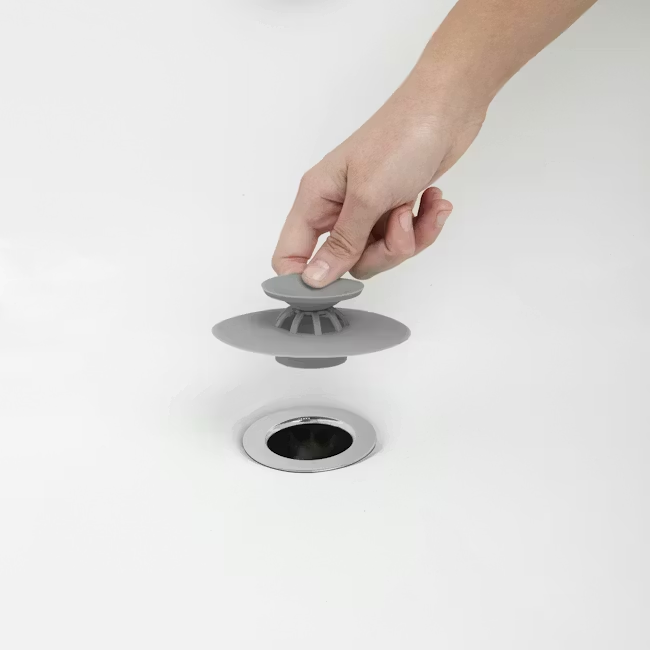 White sink drain hair catcher with flex stopper and strainer top
