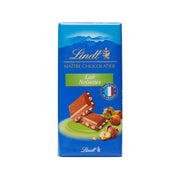 LINDT milk chocolate with hazelnut bar package, blue front with nut and chocolate pieces