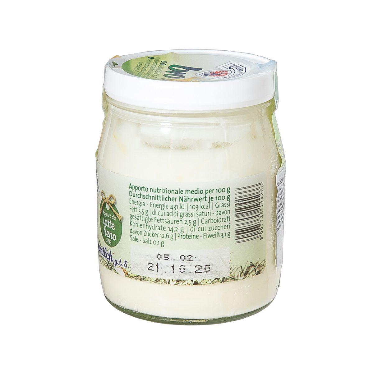 Organic yogurt jar, back view with nutrition facts label and sealed white lid
