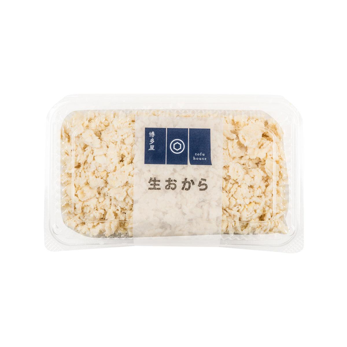 Fresh okara soy pulp in clear plastic tray, beige crumb texture, 200g pack