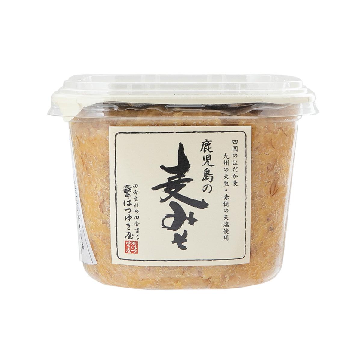 Kagoshima malt miso in clear plastic tub with white label and black Japanese lettering