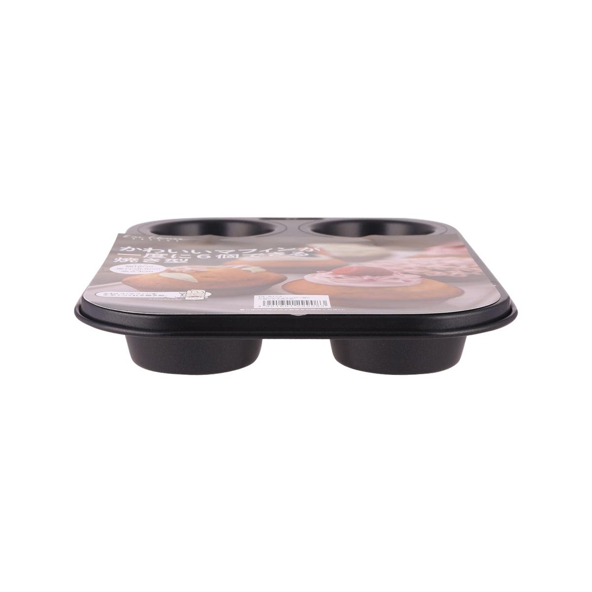 KAI 6-cup muffin mold pan with six round cavities, black base